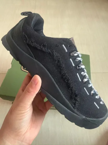 Maison Margiela Tabi Split-Toe Sneaker Black Textured Canvas Sneakers - 1