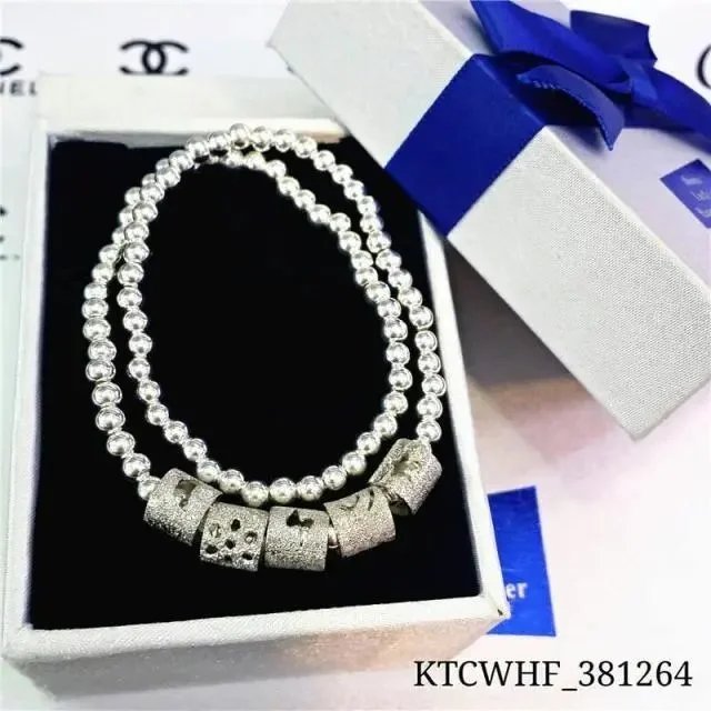 Chanel Silver Beaded Bracelet with Textured Charms - 136452