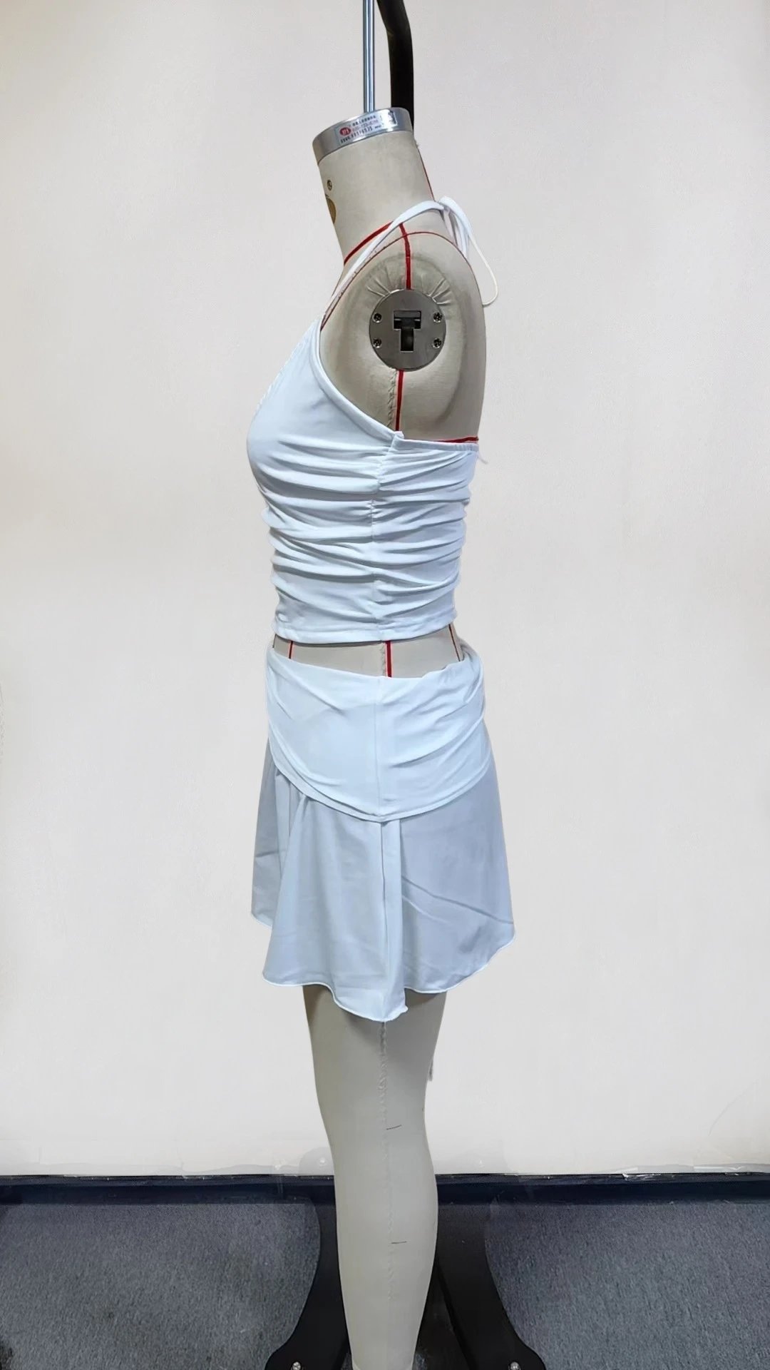 Design Halter Neck Cut-Out Crop Top and Pleated Mini Skirt Set in White - 5