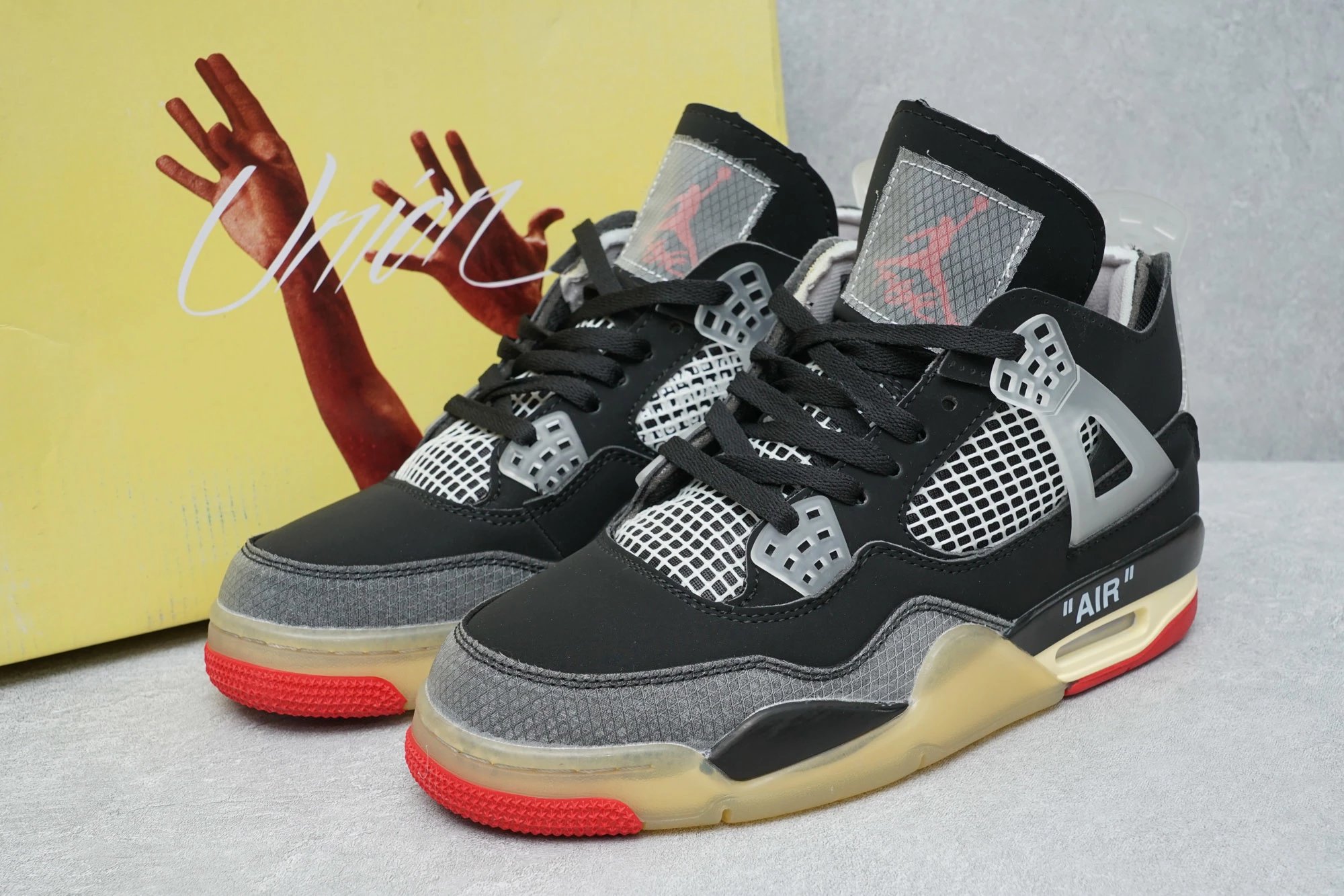 Off-White x Air Jordan 4 Bred Basketball Shoe
