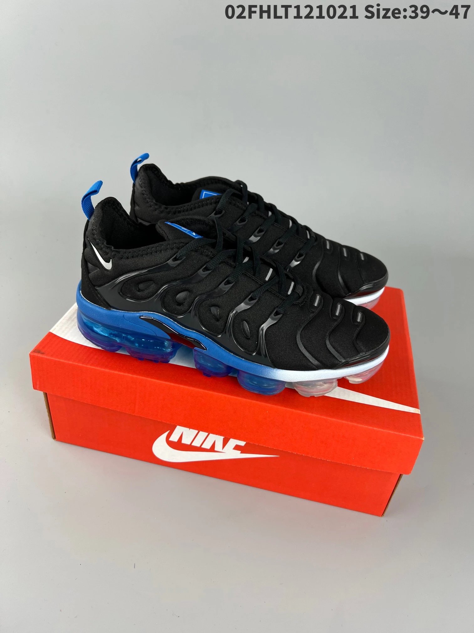 Nike Sneakers Air VaporMax Plus — Black and blue