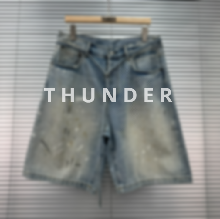 AC splashed denim shorts