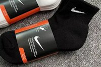 Three pairs of black towel socks