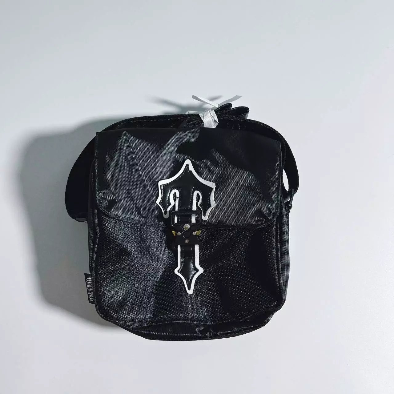 TRIPLESTUD Crossbody Bag