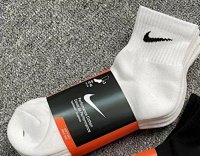 Three pairs of white towel socks