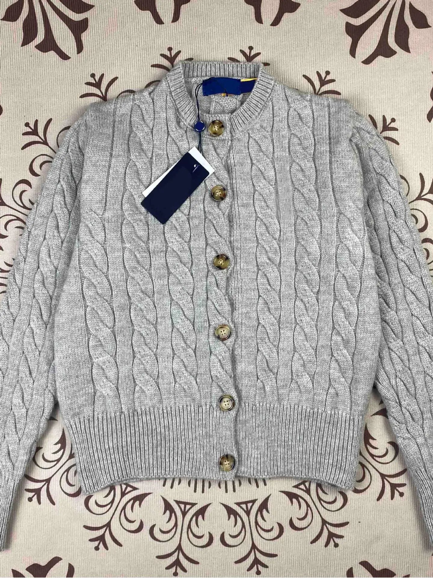 Grey round neck button
