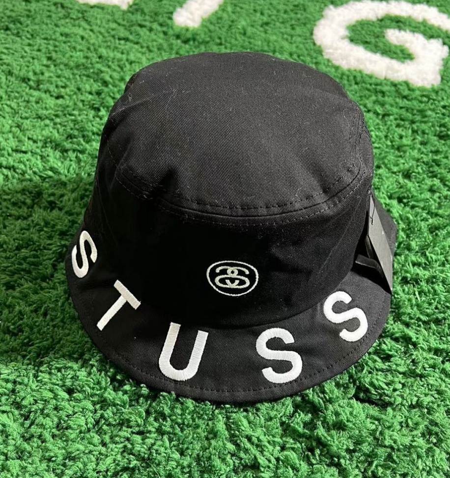 Fisherman's hat with black letters on the edge