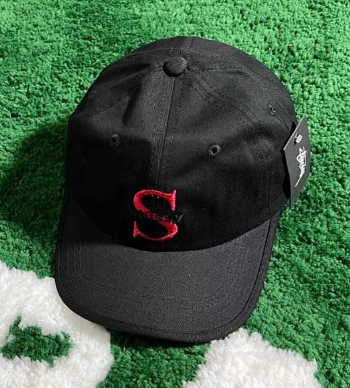 Embroidered in black