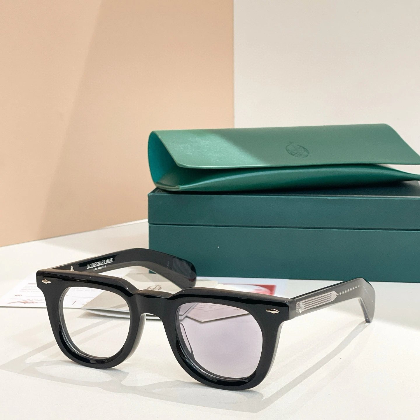 Black and silver framed gray lenses (photochromic lenses)