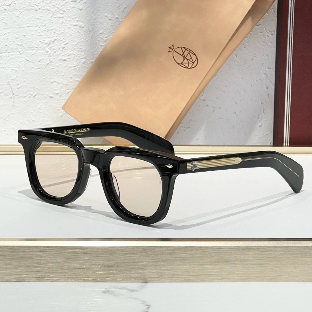 black frame, light orange sunglasses