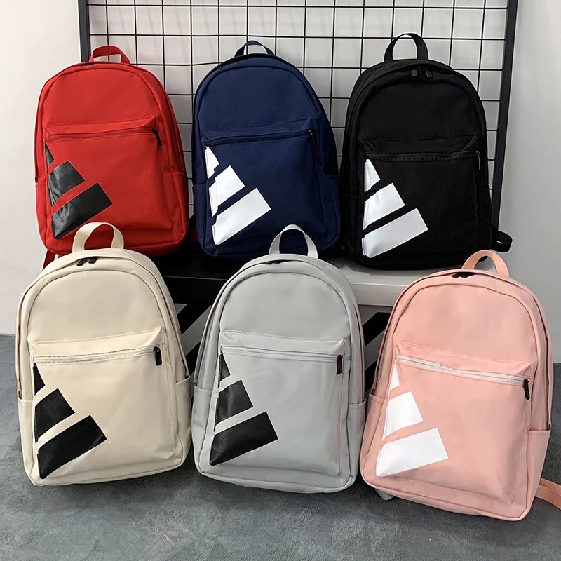 Item No. 5041504 A street trend leisure shoulder bag men and women large capacity outdoor sports backpack computer bag campus high school college students schoolbag