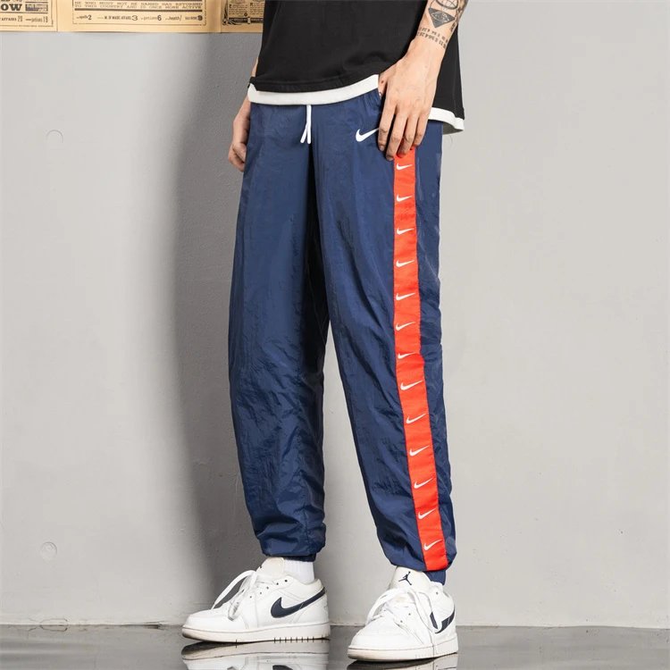 耐克运动裤男女2025新款情侣串标裤子运动裤休闲裤长裤    0422   M3XL