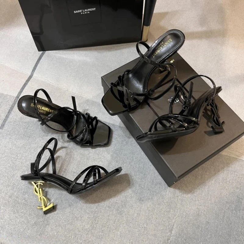 YSL one-piece strap sandals, women's 2025 new style, same as European and American internet celebrities, black patent leather sexy letter heels, high-heeled women's gold letter heels, square-toe open-toe one-piece strap sandals, crisscross strap high heel