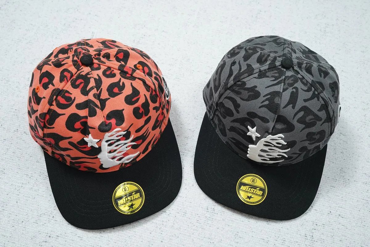 HE hat camouflage white logo