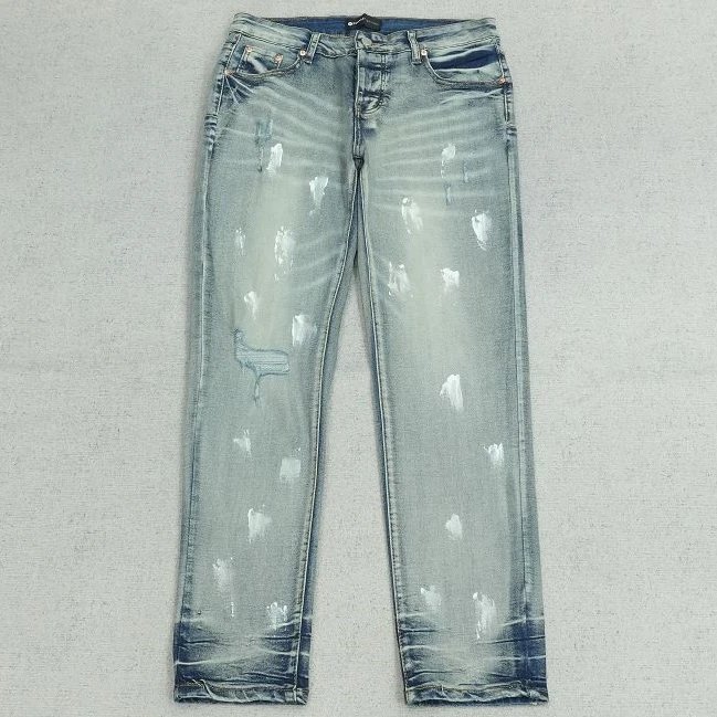 PU长裤蓝色水洗磨破泼墨微喇牛仔R1186