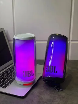 thumbnail for 8045 Newly upgraded JBL Pulsation 5th generation Bluetooth speaker 
Added lightning light effect Listening to songs at night is full of atmosphere!
360° full screen light effect with sound and light synchronization effect! !️
The lights can dance to the music, which is both beautiful and fun
Large JBL logo on the front with control buttons on the back