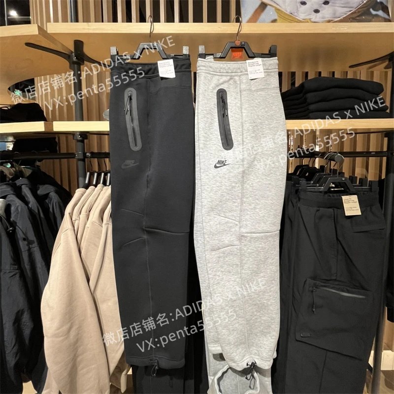 Men's Nike pants for couples, spring and autumn season, TECH FLEECE classic small hook print with large zipper pocket, retro sports pants, loose and casual knitted trendy brand pants, men's pants for training, running, drawstring closure, foot binding, straight leg pants, Nike pants, women's sports pants, men's FB8013 063 010