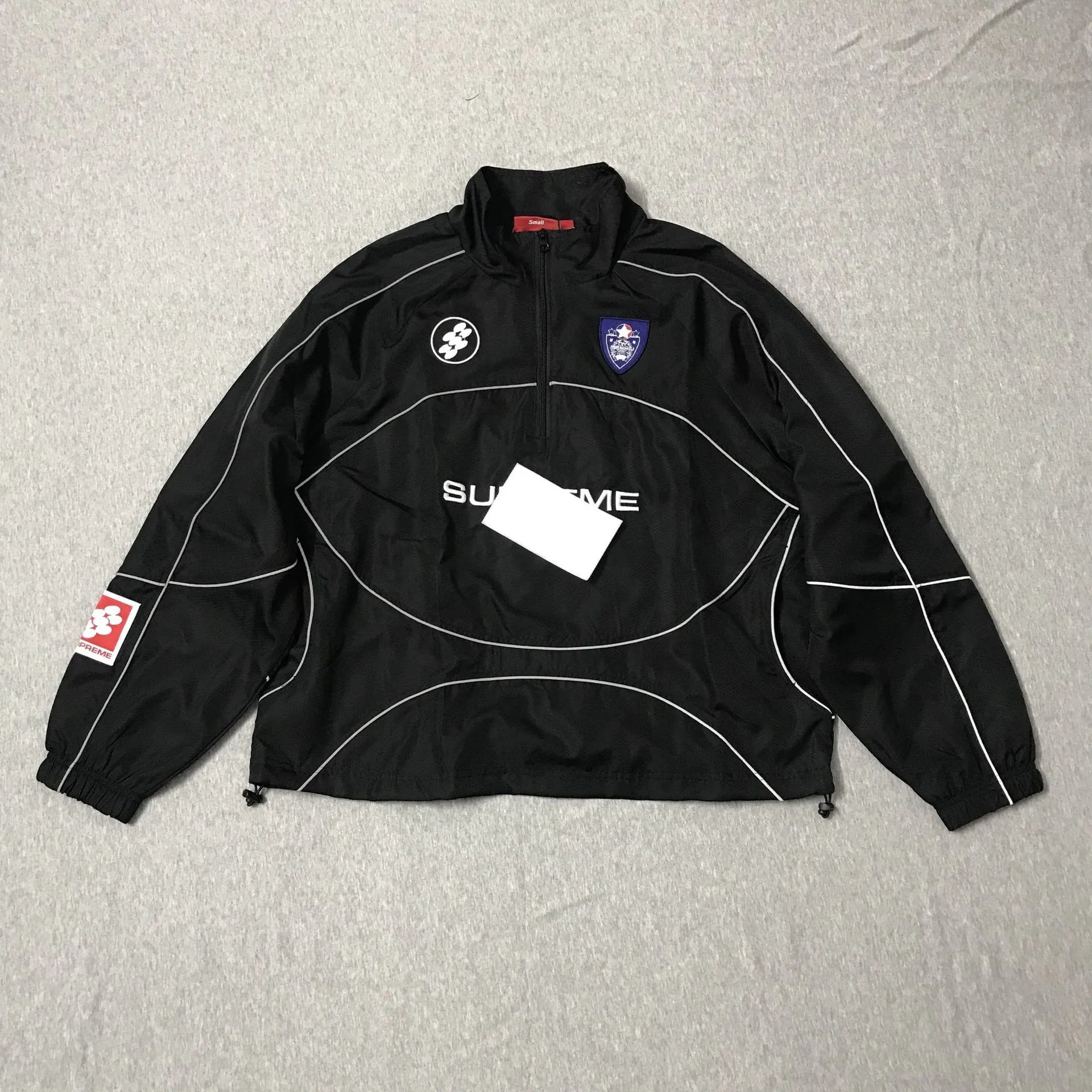 Supreme Jackets Hooded color-block logo-print jacket — 9000 Black Top