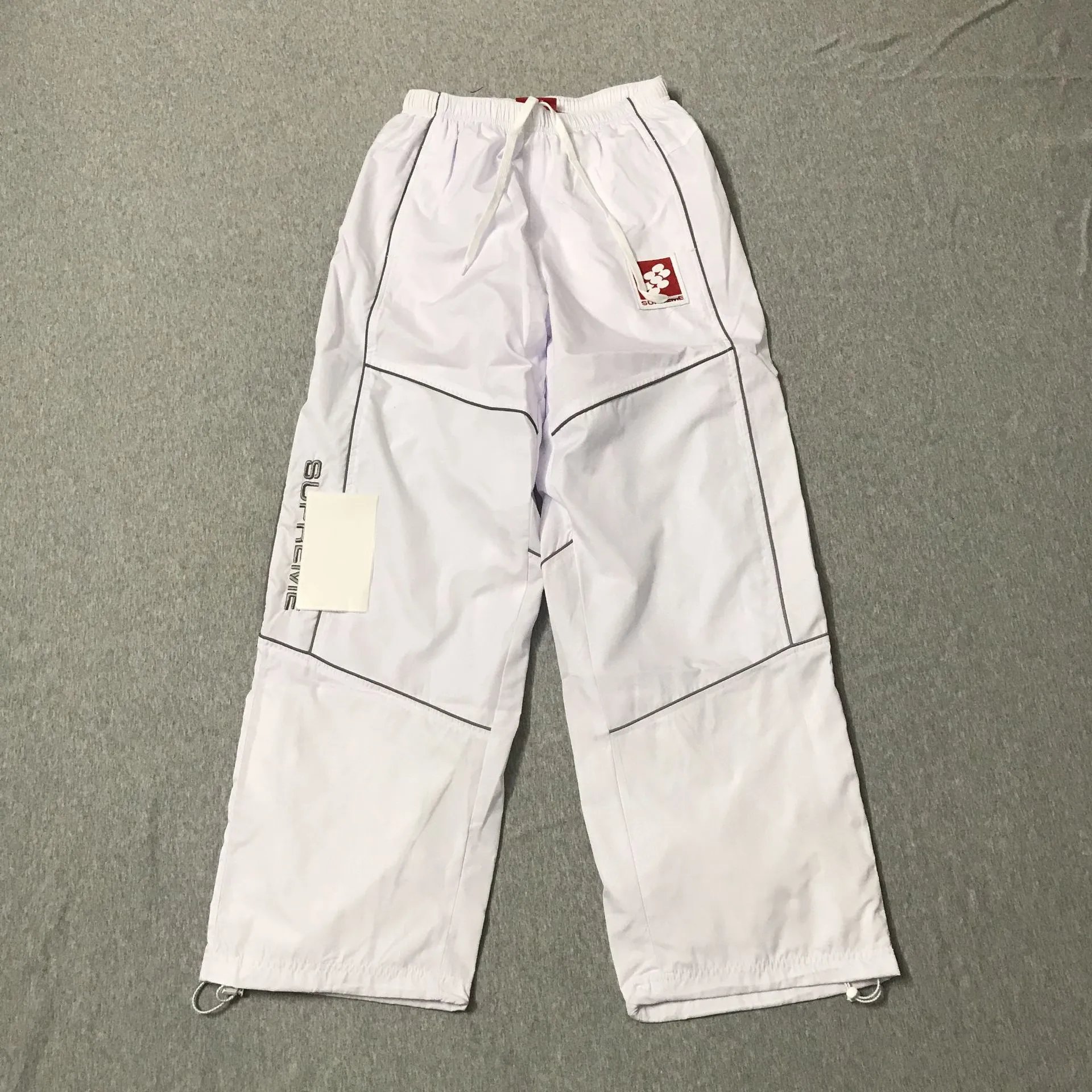 Supreme Jackets Hooded color-block logo-print jacket — 9000 White Trousers