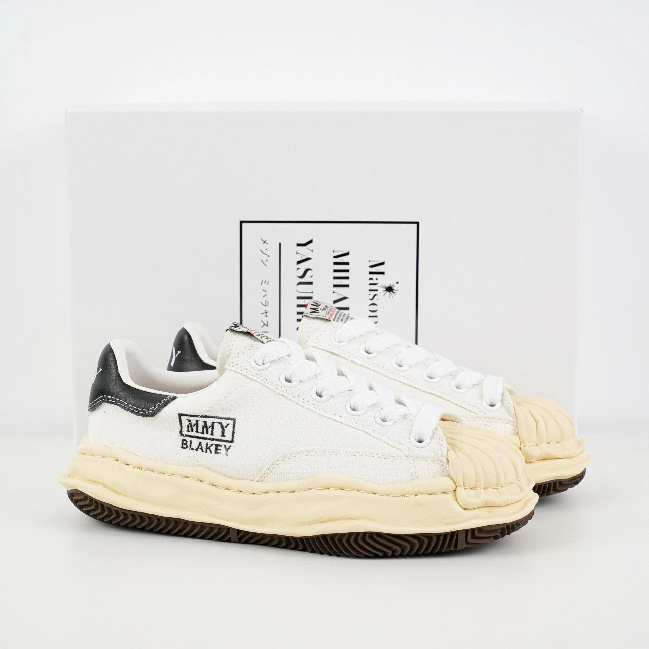 Shell-toe white canvas with a yellow sole SKU image