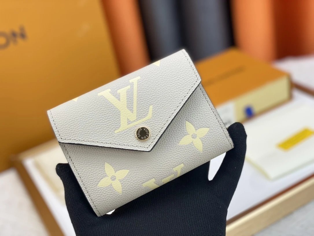 Louis Vuitton Monogram Empreinte Long Wallet Black with Pale Yellow Print - 7