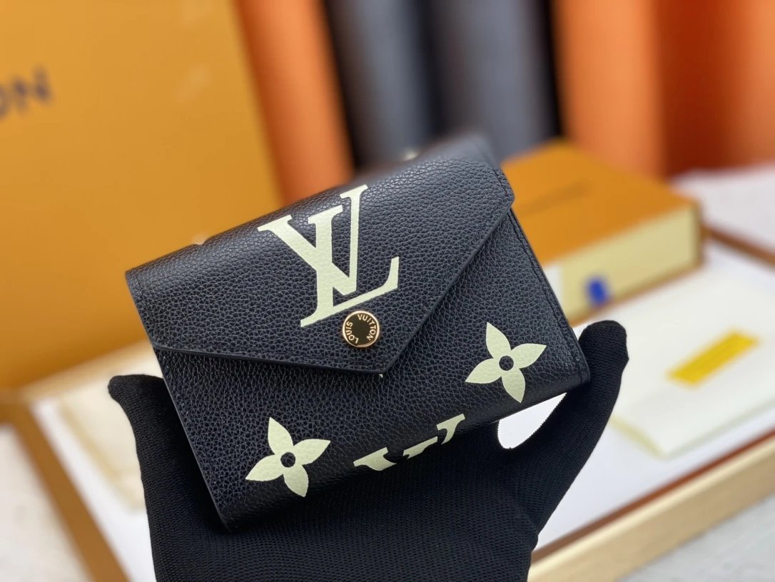 Louis Vuitton Monogram Empreinte Long Wallet Black with Pale Yellow Print - 11