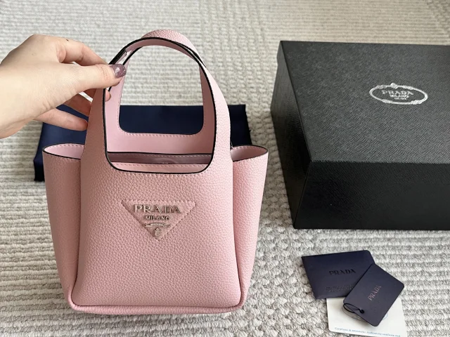 Prada Crossbody Bags Triangle-shaped bag with detachable zip pouch product detail image 19