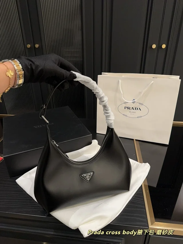 Prada Crossbody Bags Triangle-shaped bag with detachable zip pouch product detail image 37