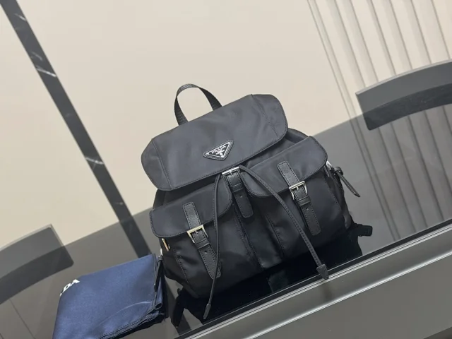 Prada Crossbody Bags Triangle-shaped bag with detachable zip pouch product detail image 38
