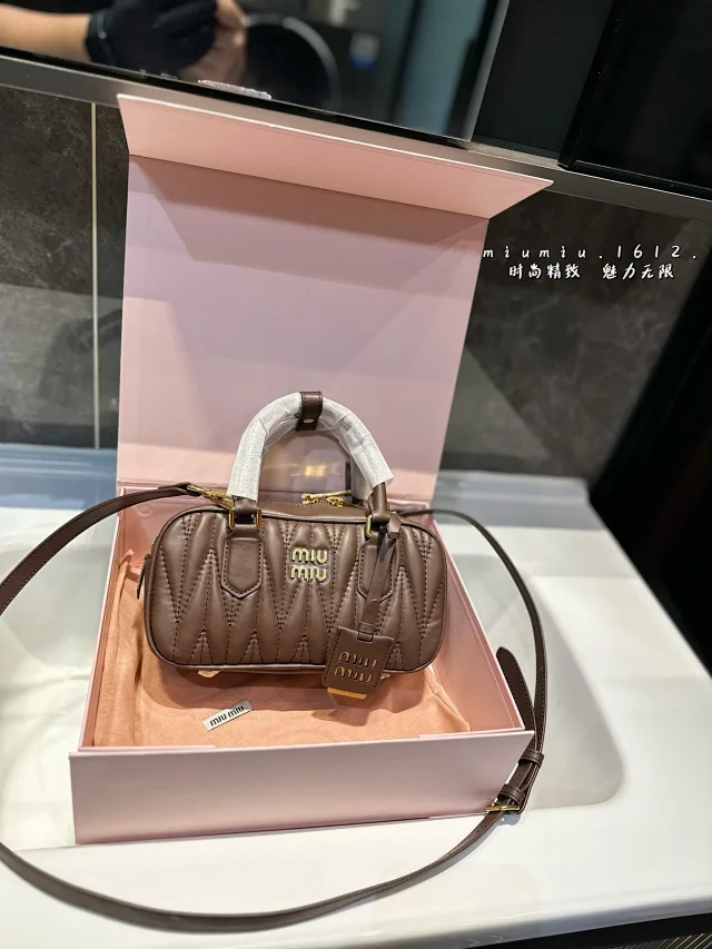 Miu Handbags Logo-Embossed Zip-Top Handbag product detail image 20