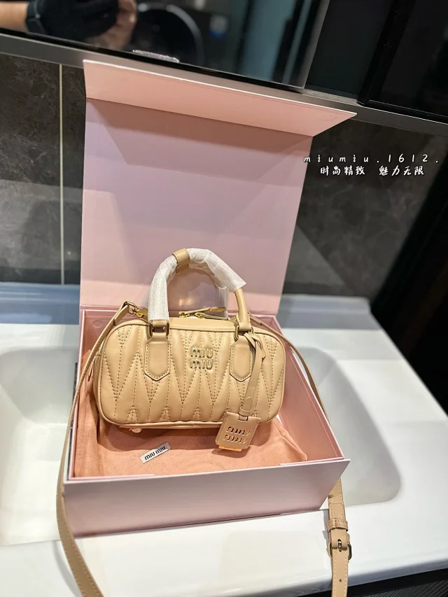 Miu Handbags Logo-Embossed Zip-Top Handbag product detail image 18