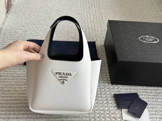 Prada Crossbody Bags Triangle-shaped bag with detachable zip pouch product detail image 18