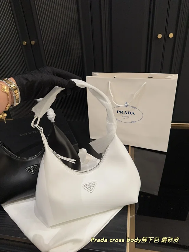 Prada Crossbody Bags Triangle-shaped bag with detachable zip pouch product detail image 36