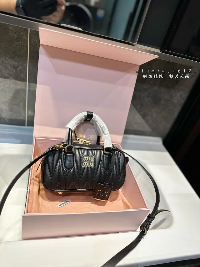 Miu Handbags Logo-Embossed Zip-Top Handbag product detail image 21