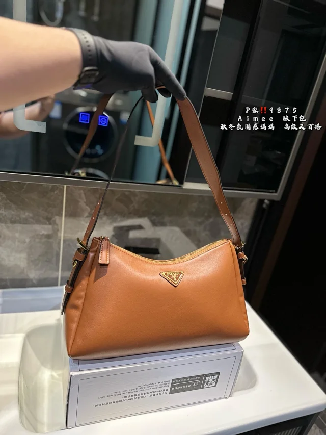 Prada Crossbody Bags Triangle-shaped bag with detachable zip pouch product detail image 11