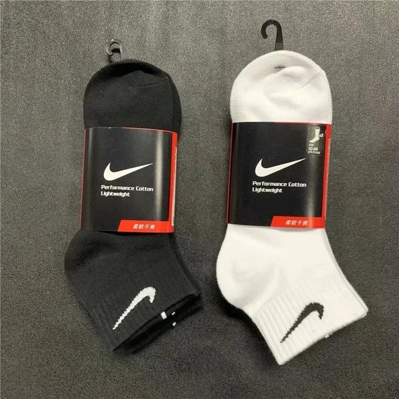 Nike basketball socks (three pairs/black and white/adult size one/color order notes)