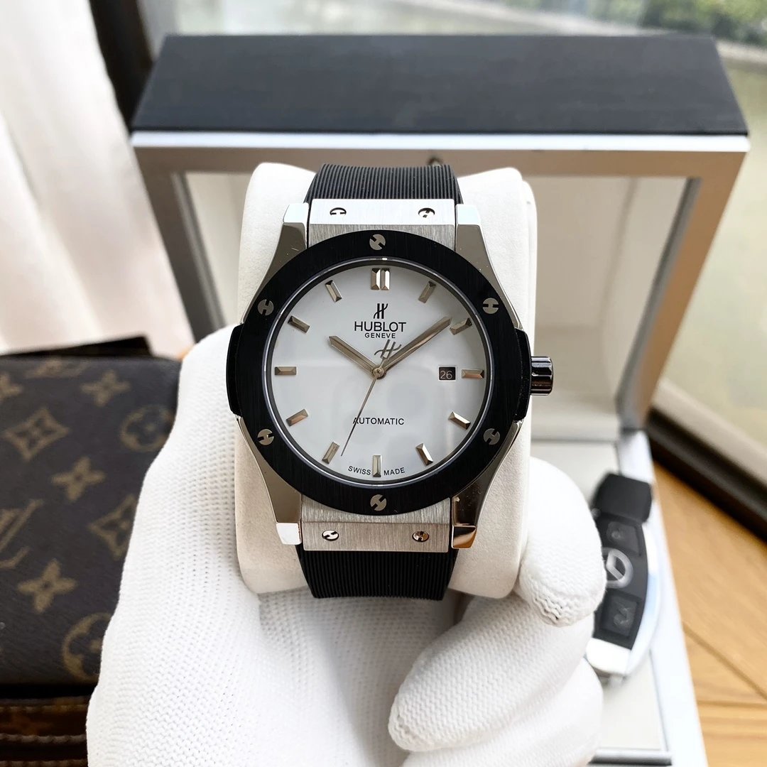 Silver Case · White Dial · Black Rubber Strap
