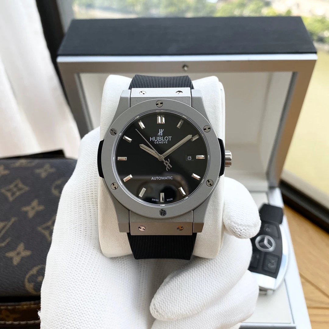 Titanium Gray Case · Black Dial · Black Rubber Strap
