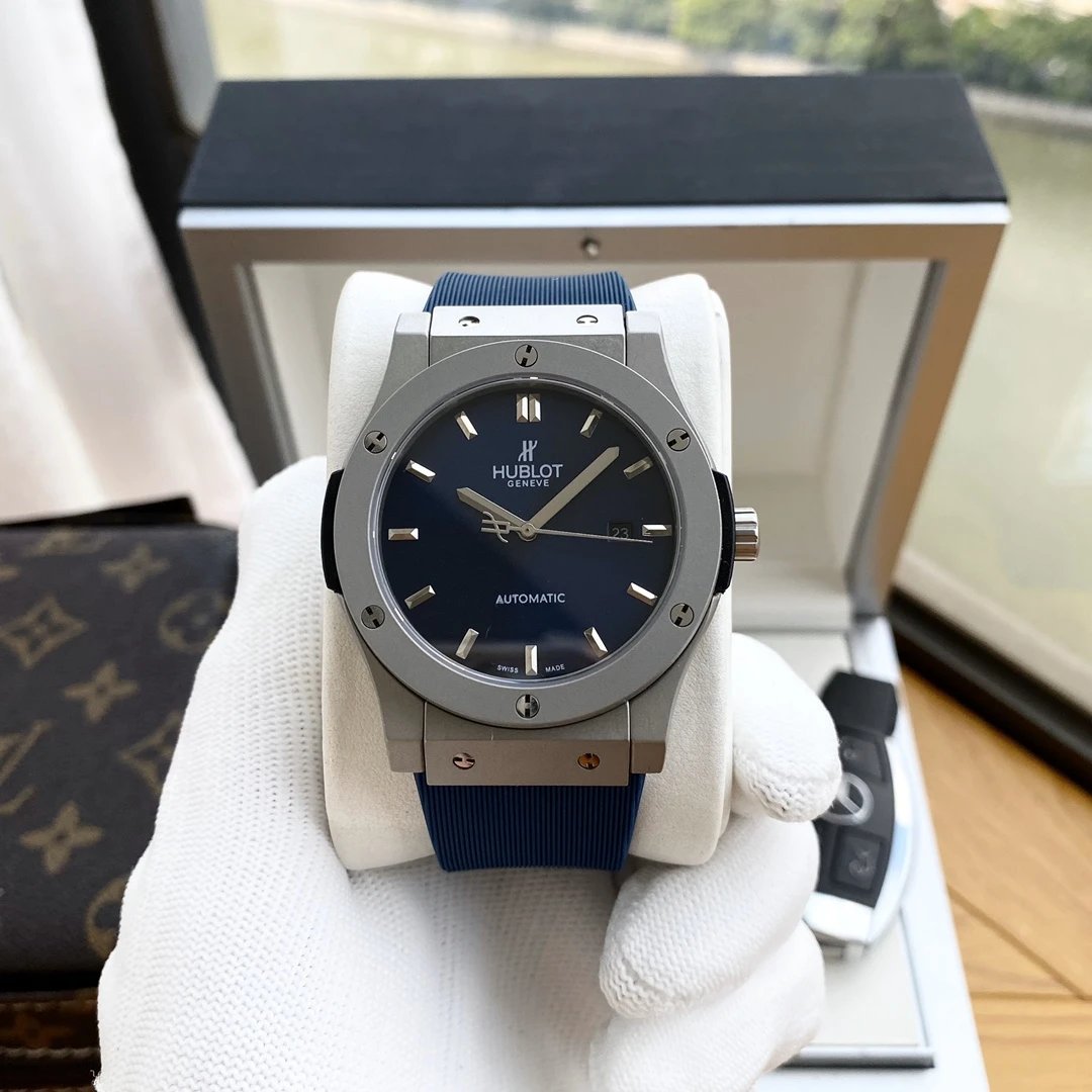 Titanium Gray Case · Blue Dial · Blue Rubber Strap