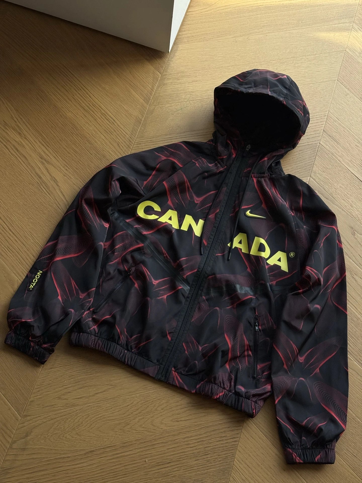 Nike co branded outdoor contrasting zipper long sleeved jacket (black and red)