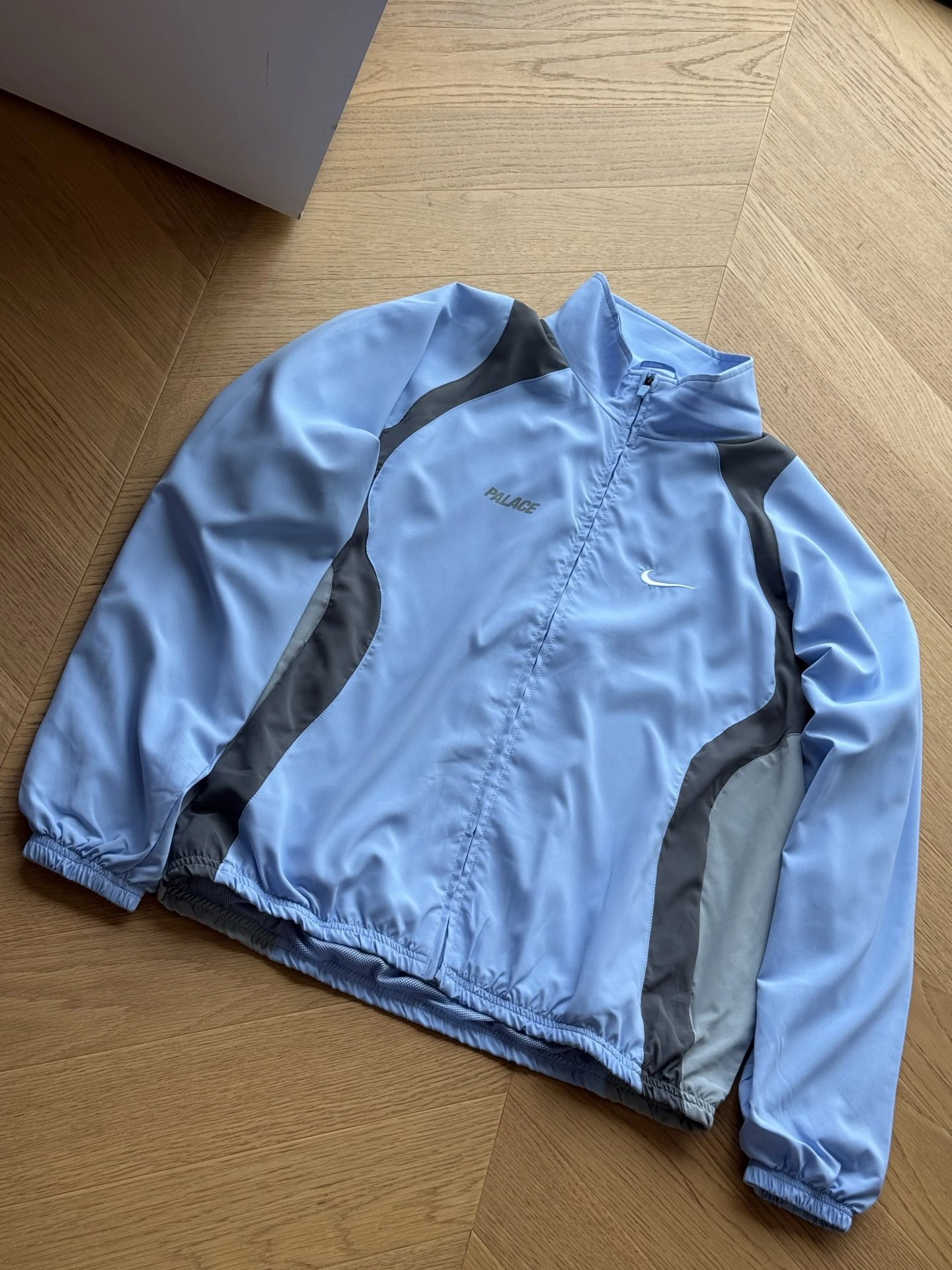 Nike Co branded Stand up Collar Zipper Long Sleeve Logo Jacket (Light Blue)
