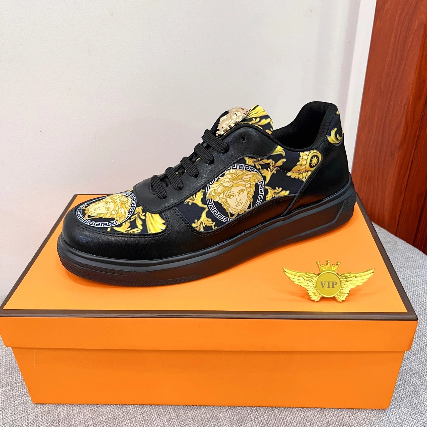 Baroque Leather Sneakers Black Gold with golden Baroque Medusa motifs - Gallery Image 5 - Detailed View