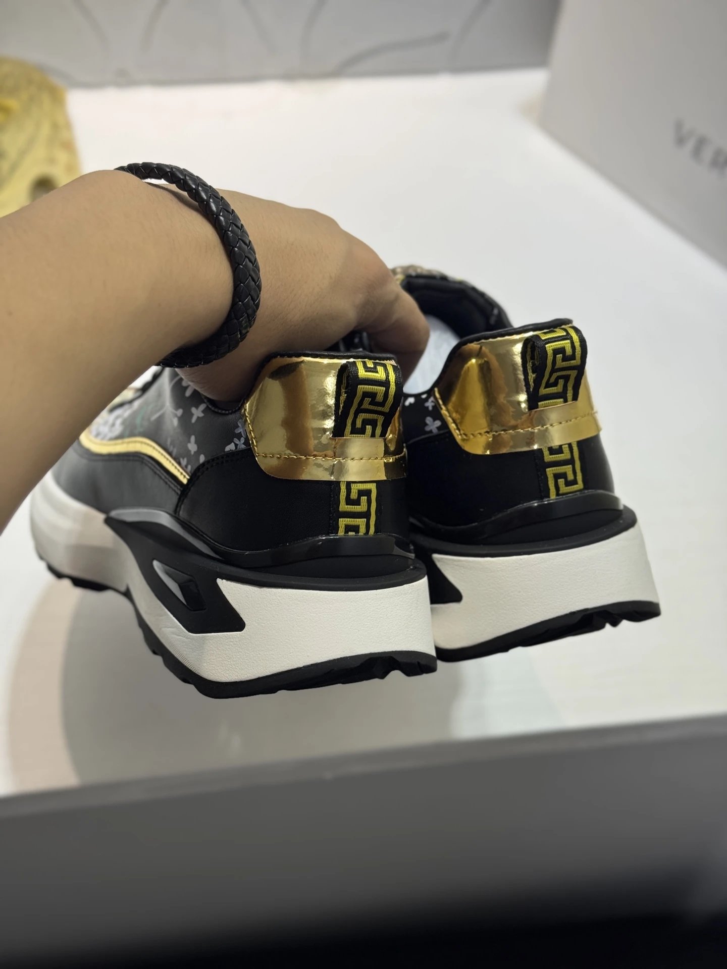 Luxury Leather Medusa Sneakers Black Gold - Gallery Image 3 - Detailed View