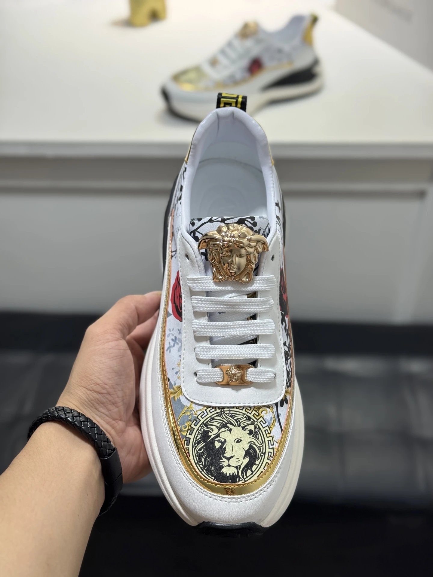 Luxury Leather Medusa Sneakers with Floral Accents White Gold - Gallery Image 5 - Detailed View