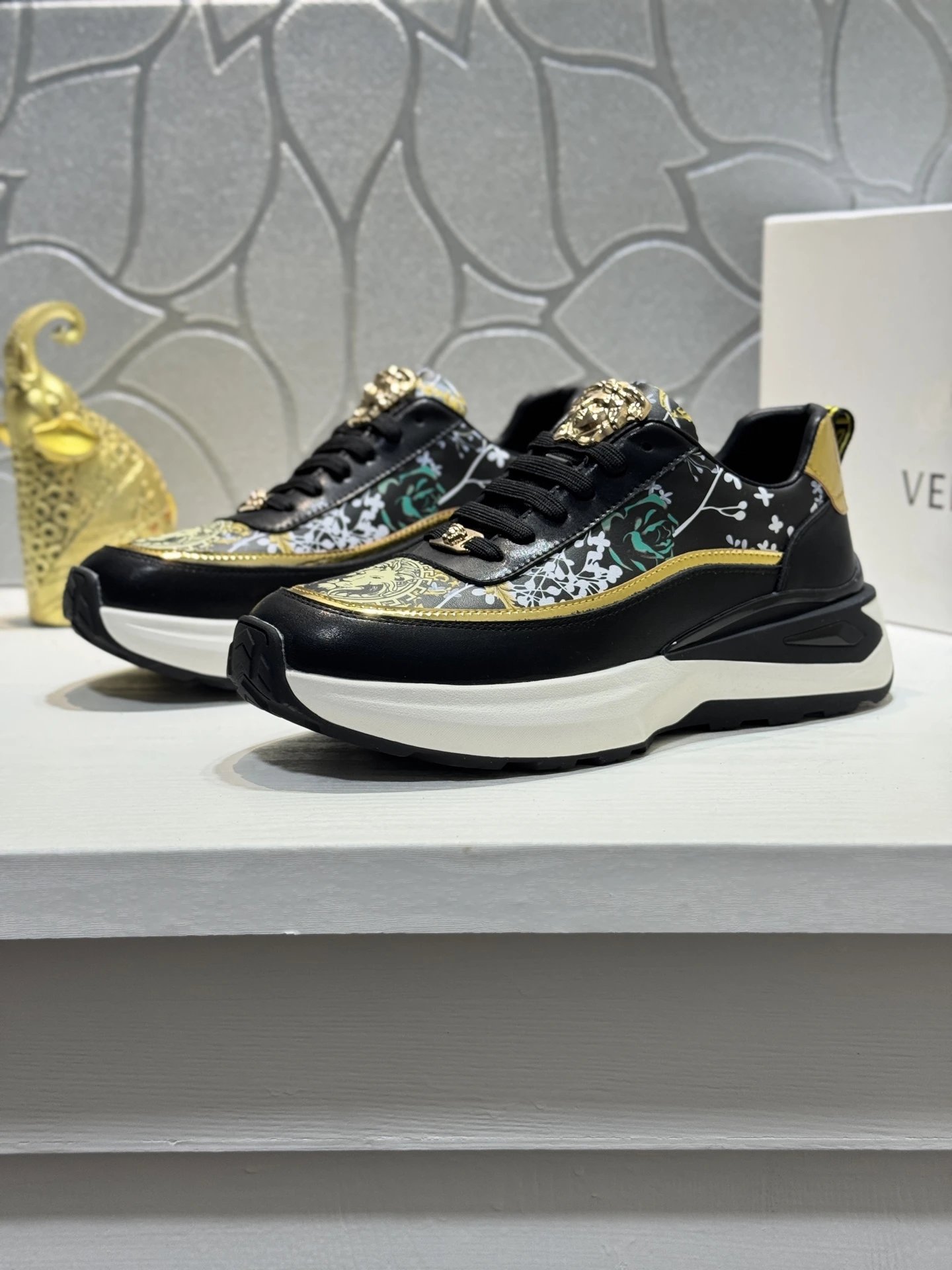 Luxury Leather Medusa Sneakers Black Gold - Gallery Image 2 - Detailed View