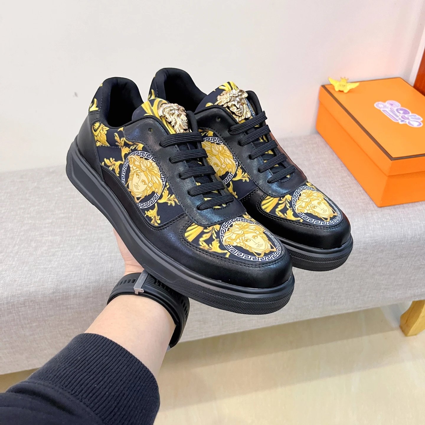 Baroque Leather Sneakers Black Gold with golden Baroque Medusa motifs - Gallery Image 4 - Detailed View