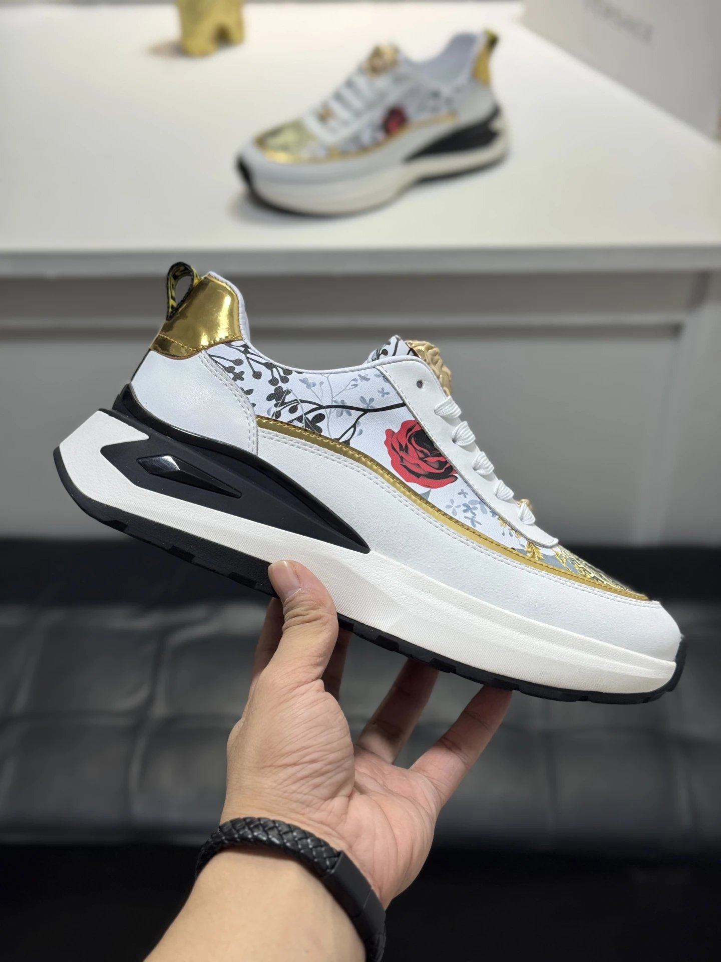 Luxury Leather Medusa Sneakers with Floral Accents White Gold - Gallery Image 4 - Detailed View