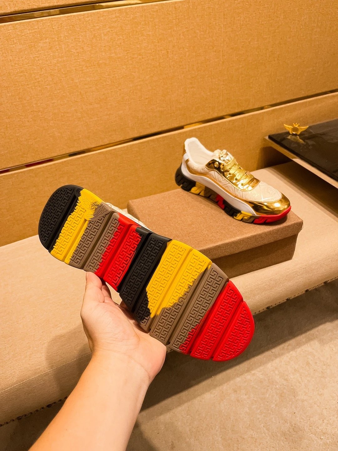 Luxury Leather Sneakers with Medusa Detail in Metallic Gold - Gallery Image 8 - Detailed View