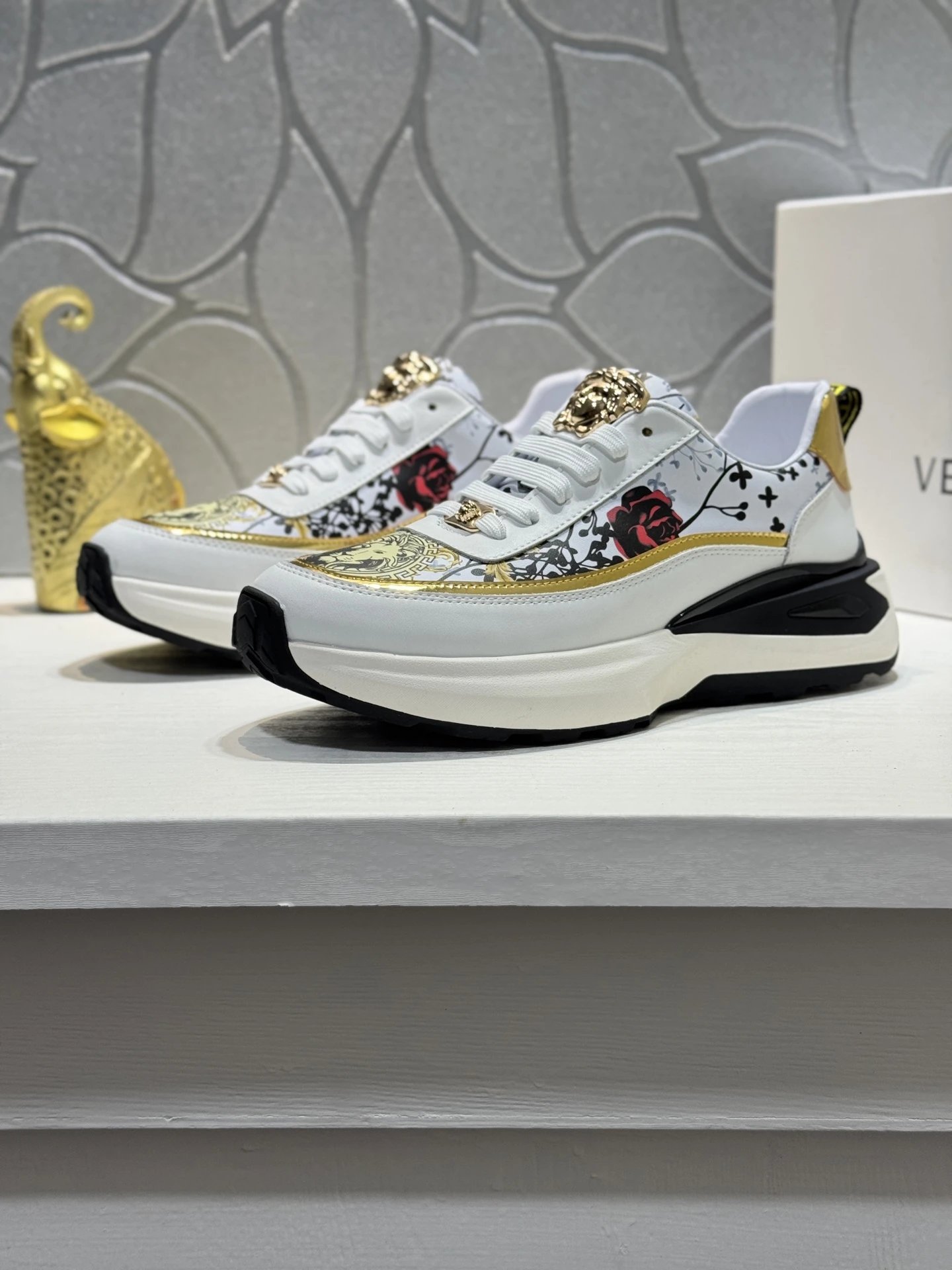 Luxury Leather Medusa Sneakers with Floral Accents White Gold - Gallery Image 2 - Detailed View
