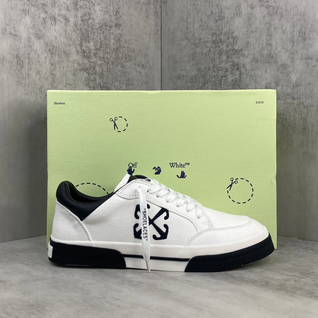 Low Vulcanized Canvas Sneakers Leather Lining Ivory Black - Gallery Image 1 - Detailed View